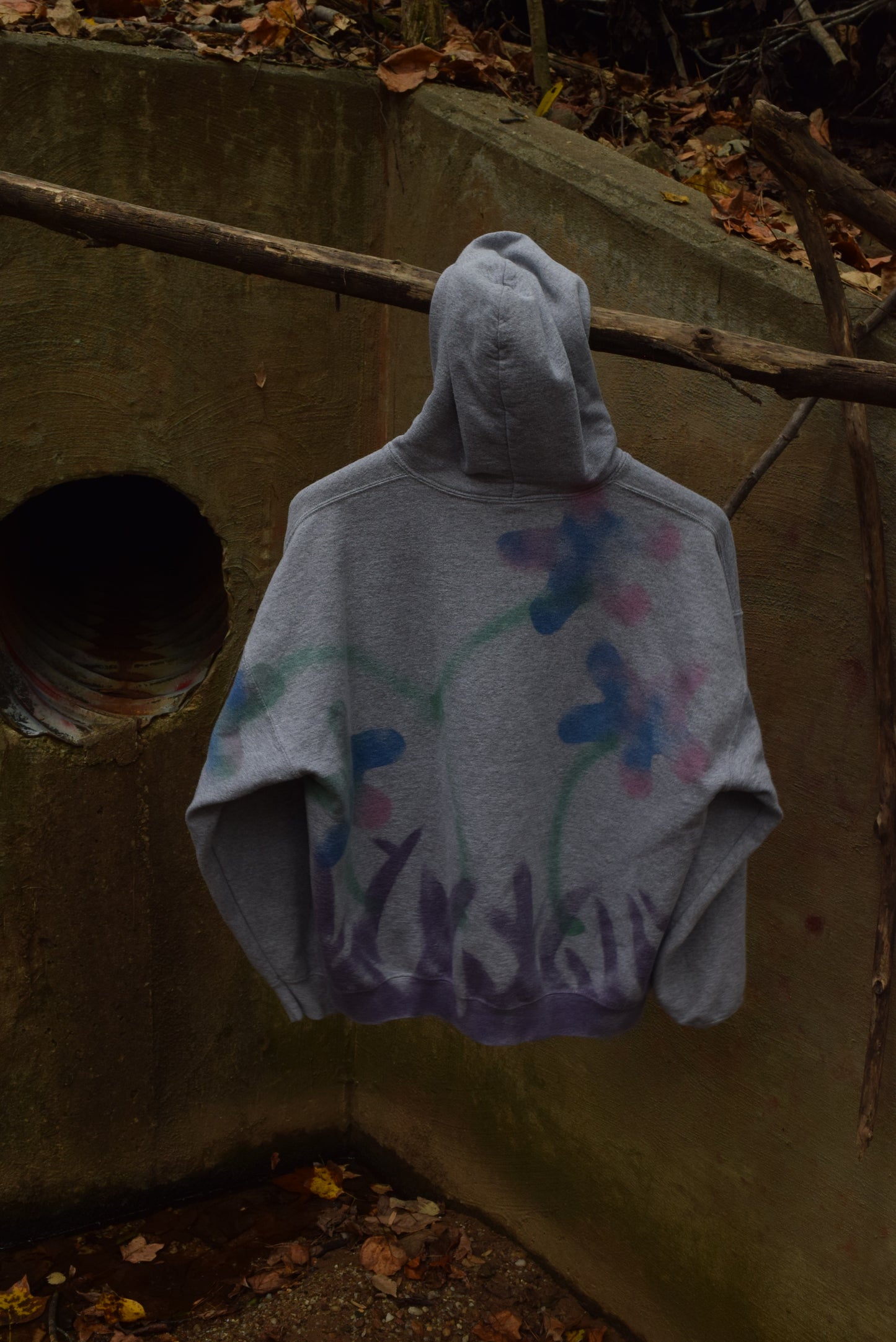 Grazing Cow in Field of Flowers Hoodie