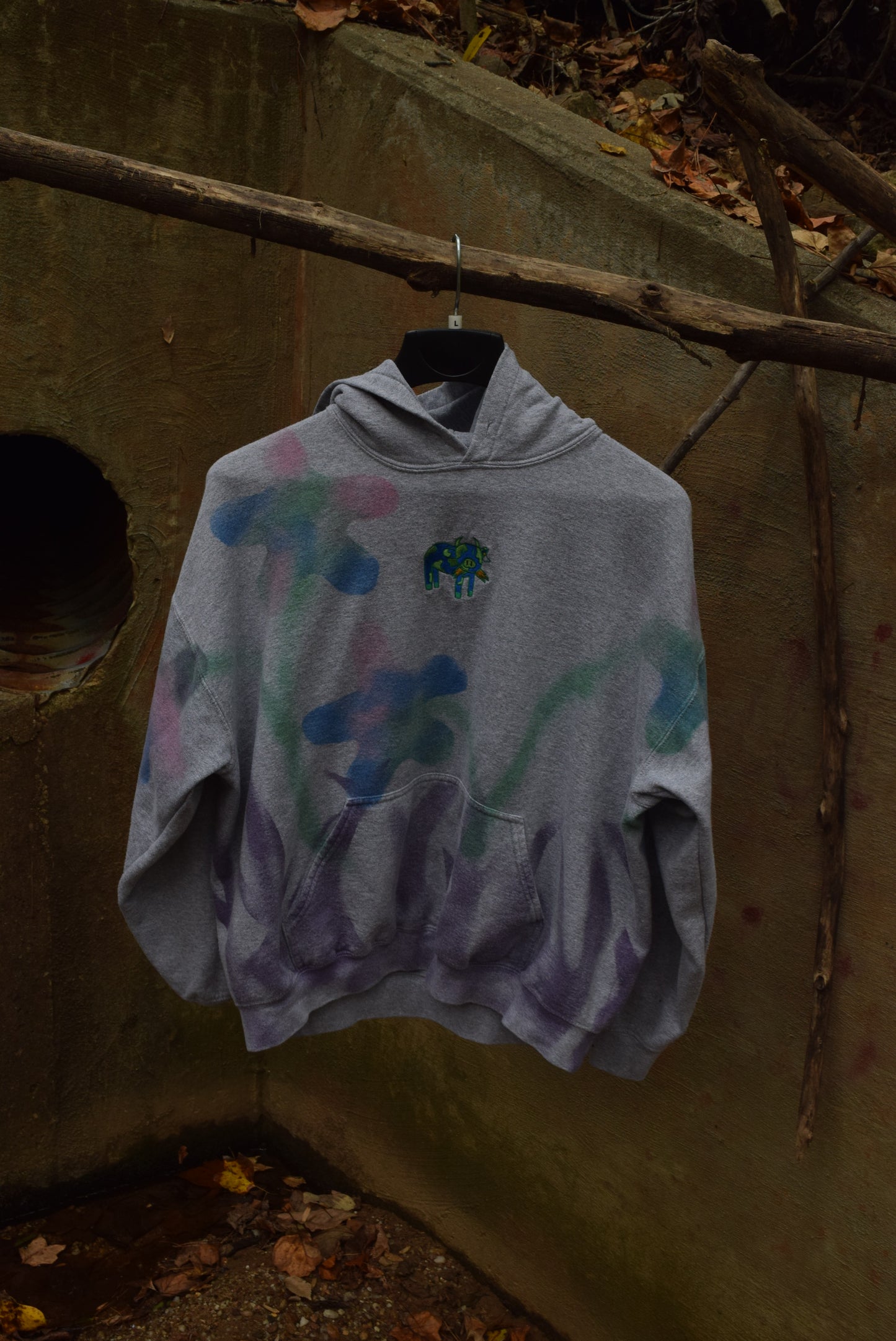 Grazing Cow in Field of Flowers Hoodie